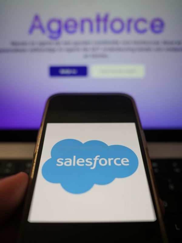 Roosendaal, The Netherlands - March 10, 2025: A mobile phone displaying the logo of Salesforce, with the company website, displaying Agentforce, in the background.